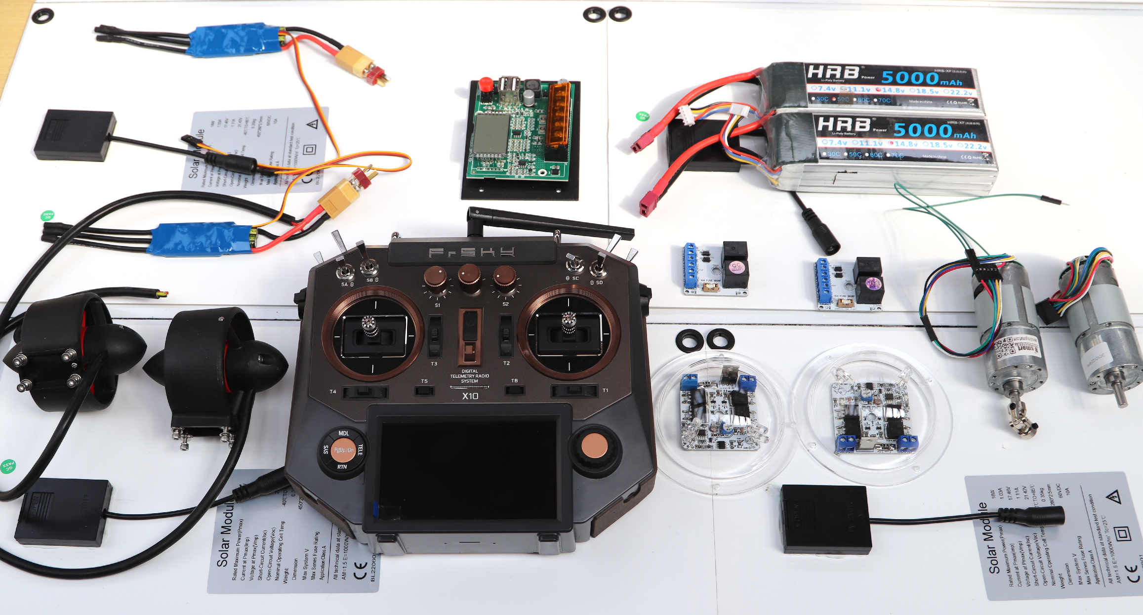 The radio control rx and tx, jet drives and solar panel charge and sun tracking equipment